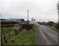 H9958 : Derrymacfall Road by Robert Ashby