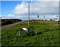 SS8077 : Advertising bicycle supported by a pole near Mallard Way, Porthcawl by Jaggery