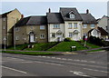 Steps up to houses on a suburban corner of Frome