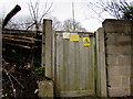 Wooden gate at the entrance to a Berkley Road electricity substation, Frome