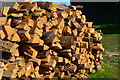 Log pile at Perry Hill Farm