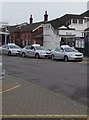 Grey taxis outside Fratton railway station, Portsmouth