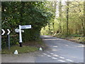 Signpost at junction of three lanes