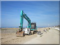 SH9980 : Excavator on Rhyl seafront by Jeff Buck