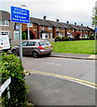 Bilingual instruction for cyclists on a Llanyravon corner, Cwmbran