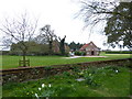 Looking across from the churchyard to the village hall