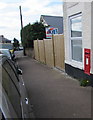 King George VI postbox in a Primrose Hill wall, Lydney