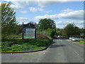 Approaching a bend on Essendon Hill (B158)