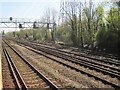 View from a Southampton-Salisbury train - signal gantry and sidings outside Southampton