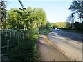 Lay-by with bus stop on A283 at Buncton Crossroads