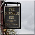 The sign of The Stumble Inn