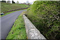 NW parapet of Pismore Bridge taking Stockshott Lane over Pismire Beck