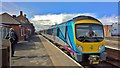 TransPennine Express Class 185 beside the sea at Cleethorpes