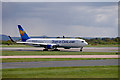 SJ8183 : Boeing 767 at Manchester Airport by David Dixon