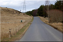 NH9720 : Power Lines over the B970 near Cullachie by David Dixon