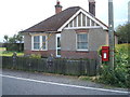 Elizabeth II postbox on Bradfield Road, Wix