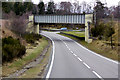 NH9017 : Railway Bridge Across the A95 at Laggantygown by David Dixon