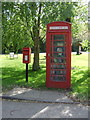 Elizabeth II postbox and telephone box on Manningtree Road, Little Bentley