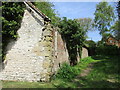 Footpath and dilapidated building