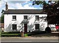 House by the junction of The Street and School Road