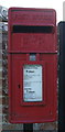 Close up, Elizabeth II postbox outside the Fighting Cocks public house