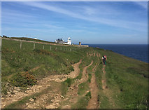 SZ0276 : The South West Coast Path approaching Anvil Point Light by John Allan