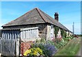 NU1135 : Easington Grange Cottages by Anthony Parkes