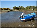 Boat in dried sea pool