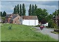 Cycling along the High Street in East Butterwick