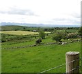 Large harvested hay field between Dolmen Road and Legananny Road