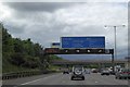 TQ0384 : Gantry and A412 bridge over M25 by David Smith