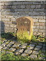 A Chester Boundary Stone in front of Bridge farm, Kinnerton