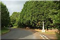 Road past war memorial, Great Comberton