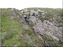 NN4898 : Rocky tributary of Allt Feith a' Mhoraire high above upper Speyside by ian shiell