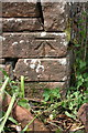 Benchmark on Salkeld Road wall angle