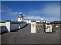 G7069 : Lighthouse at St John's Point by Kenneth  Allen
