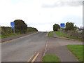NU2324 : No parking signs, Low Newton by the Sea by Stephen Craven