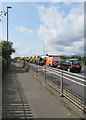 Wollaton Road: flower baskets on the railway bridge