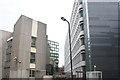 View of the rear of shops on Great Eastern Street from New Inn Yard