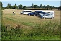 SO8444 : Minibuses parked in a field by Philip Halling