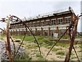SZ6898 : Derelict MOD building by Fort Cumberland by Steve Daniels