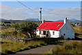 Red roofed cottage at Crask, Farr