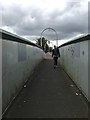 Footbridge over The NET tram tracks and the Robin Hood Line