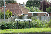 TL8783 : Mundford Road sign by Geographer