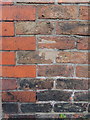 Infilled bench mark in Townley Street, Macclesfield