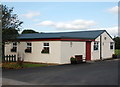 Clatt village hall with playing field behind