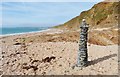 Stone column on the beach at Fishing Cove, Gunwallow, Cornwall