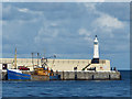 SC2484 : Fishing boat and lighthouse, Peel by Robin Drayton