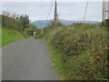 J1809 : View due North along Rooskey Road by Eric Jones