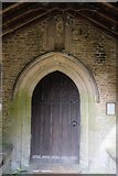 TF0246 : St Peter's Church: South Door by Bob Harvey